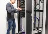 Technician working on server rack