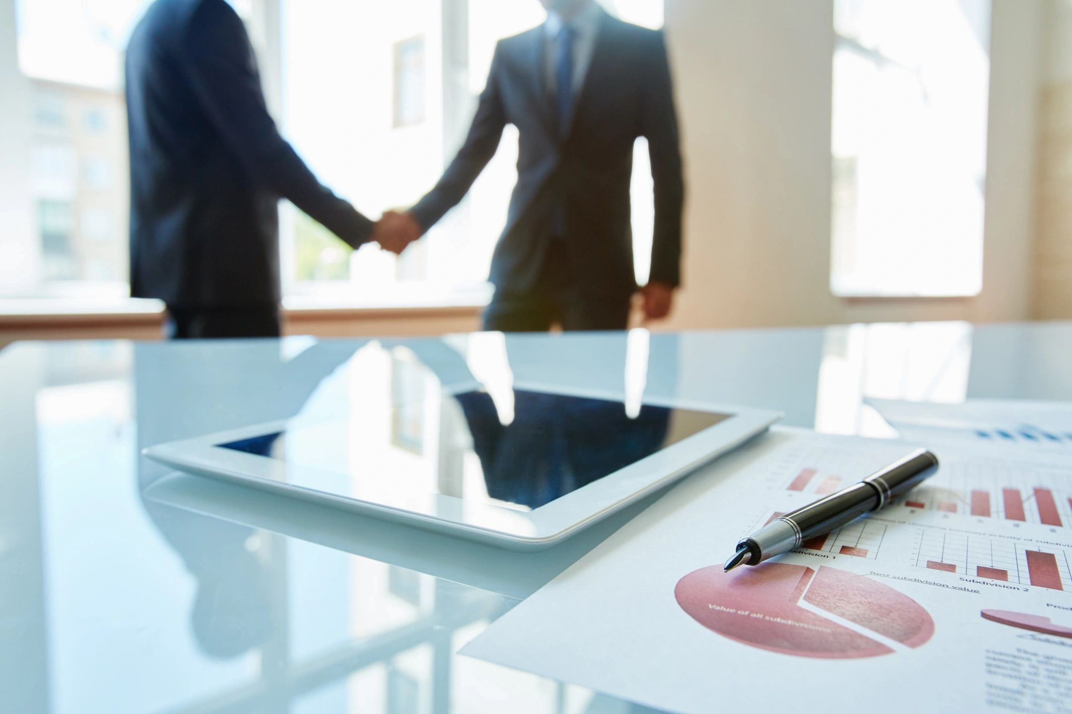 Business handshake executives